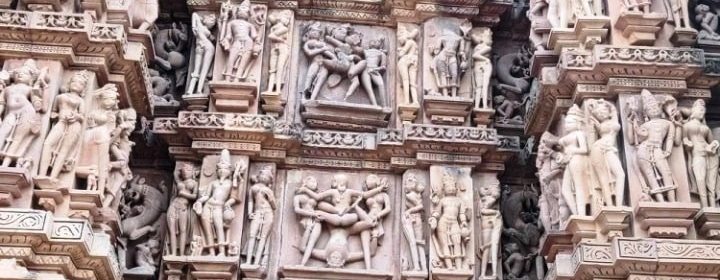 Khajuraho temple carving Kamasutra scenes
